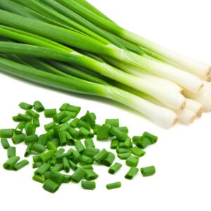 chopped green onions on white